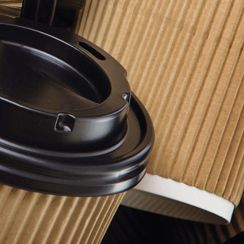 Coffee cup recycling | Coffee cups with lids closeup | Veolia UK